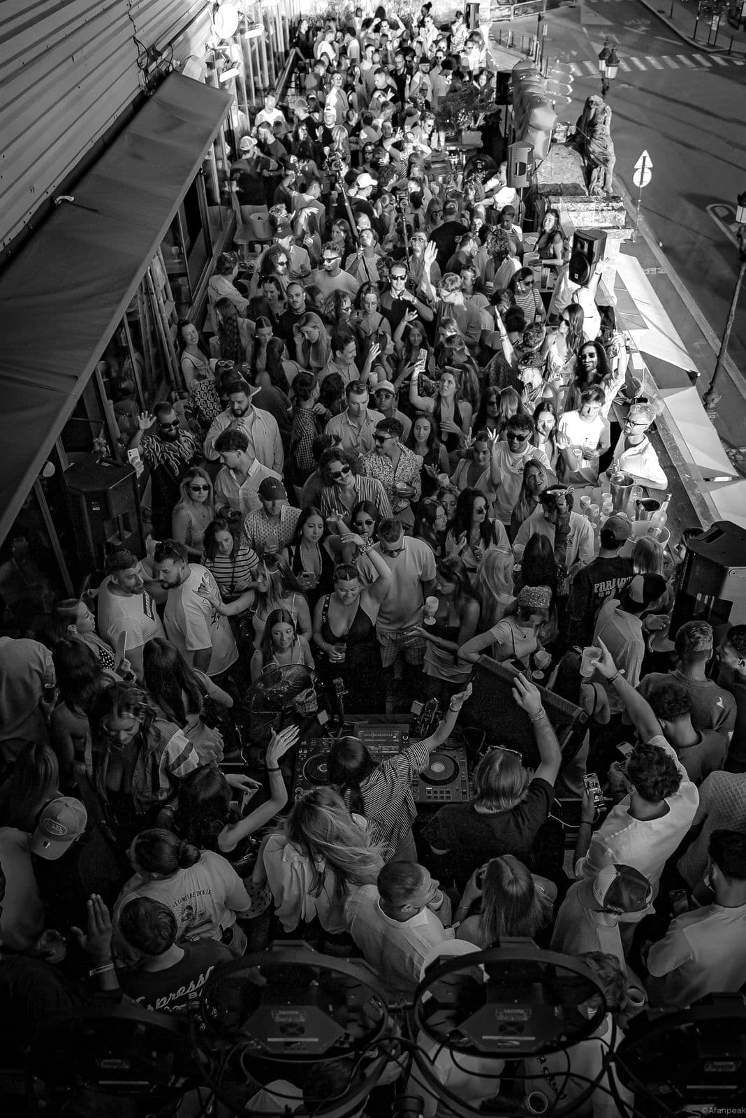 Crowd seen from above at an open-air electronic music event